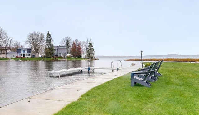 Cadillac Vacation Rental with Dock on Lake Mitchell!