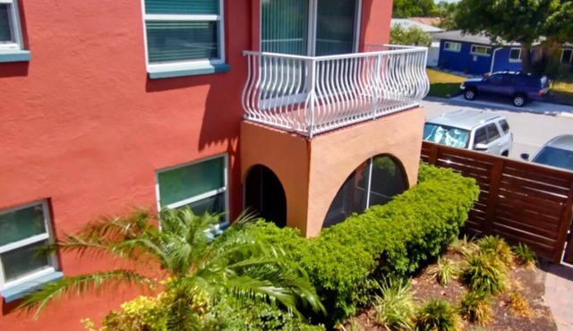 calming coastal condo walkway to beach.