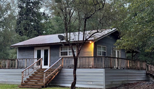 Camp House on Red Creek - Uncle Ralph’s Cabin Rentals - PRIVATE BEACH