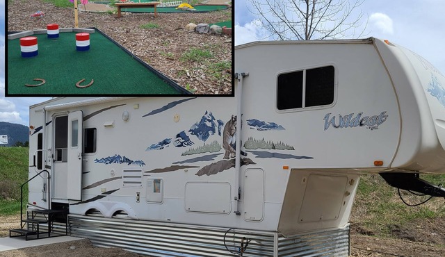 Camper at Minigolf Course COUGAR