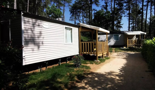 Camping Ushuaïa Villages les Pins d'Ucel * - HIRONDELLE - mobile home 28 m² + TV for 5 to 6 people - 5 people. included in the price