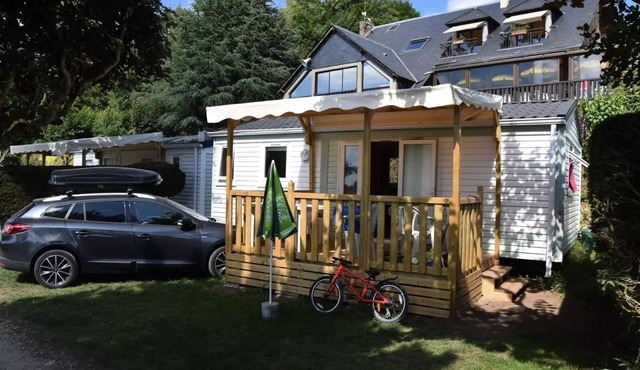 Campsite Beau-Rivage * - EVASION Cottage "Lake view" (covered terrace) New in 2024 4 to 5 people - 4 people. included in the price