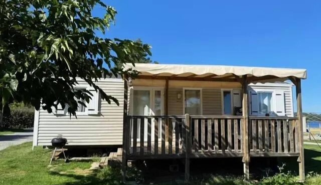 Campsite Flower Le Port de Neuvic * - Comfort mobile home 36m² (3 bedrooms - 6/7 people) 2 bathrooms + covered terrace for 7 people