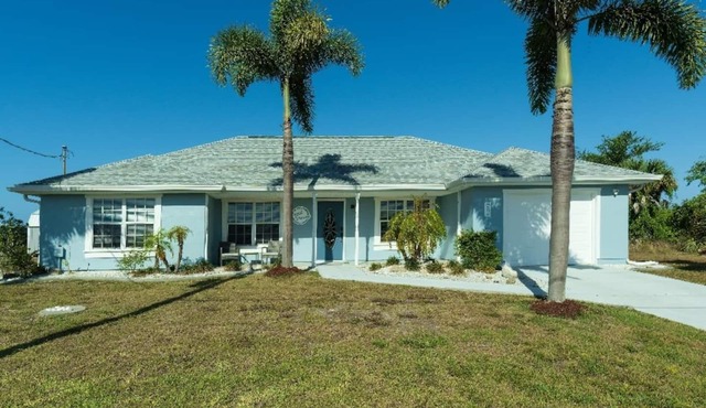 Canal Dreams a Gorgeous 3 BR/2 BA home with heated pool on the canal