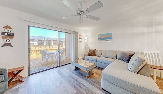 Canal-front condo with deck, balcony, grill, pool, dock, & tennis - near beach