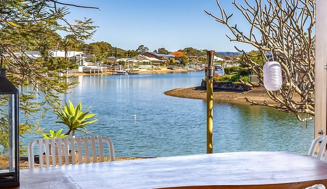 Canal Front family Home with expensive undercover outdoor area and pool