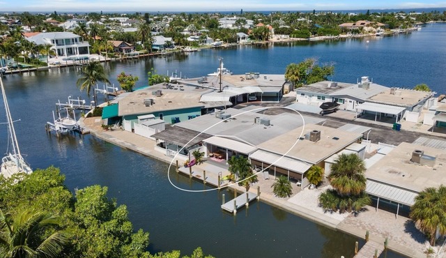 Canal-Front Home with Dock and Walk to Beach