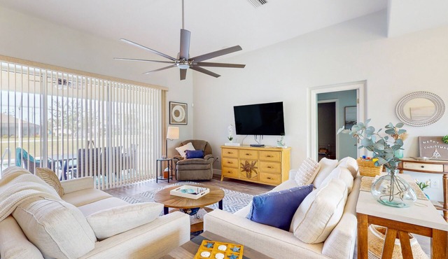 Canal-front home with private heated pool, patio, canal views & bikes