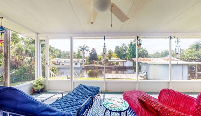 Canal-Front Home with Private Covered Boat Dock & Waterfront Screened Porch