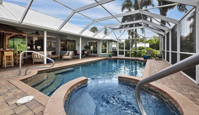 Canal-Front Luxury | Heated Saltwater Pool/Spa | Fishing Dock | Near the Beach!