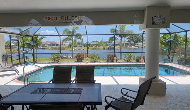 Canal Home w/Escape Room, Pool & Dock, Pets OK