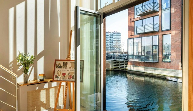 Canal house with floating deck and canal access