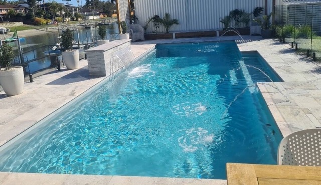 Canal Waterfront Retreat Hosts 10 Pool & Spa