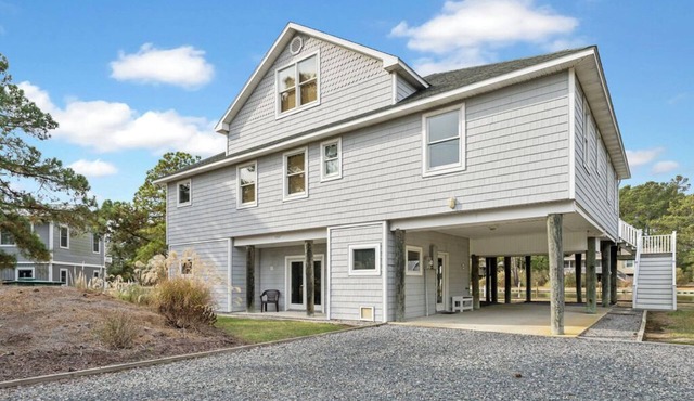 Canalfront home with Screened Porch by Seaside Vacations & Sales