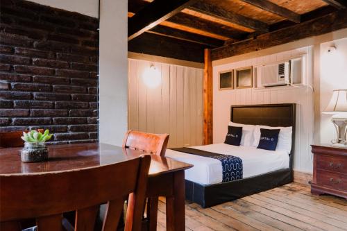 Capital O Hotel Villa Azura