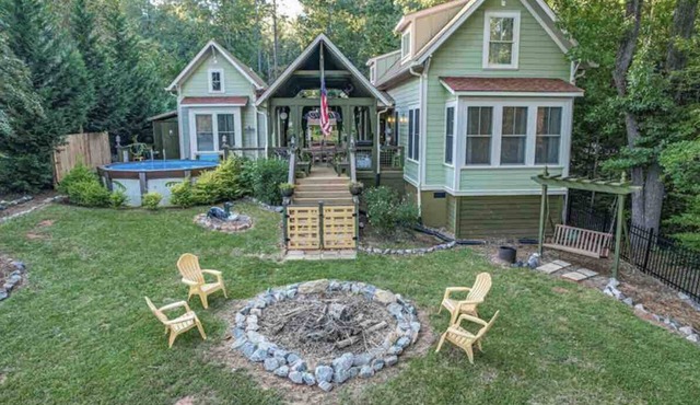 Captain’s Cove Lake Cottage with Dock, Pool, & Game Room