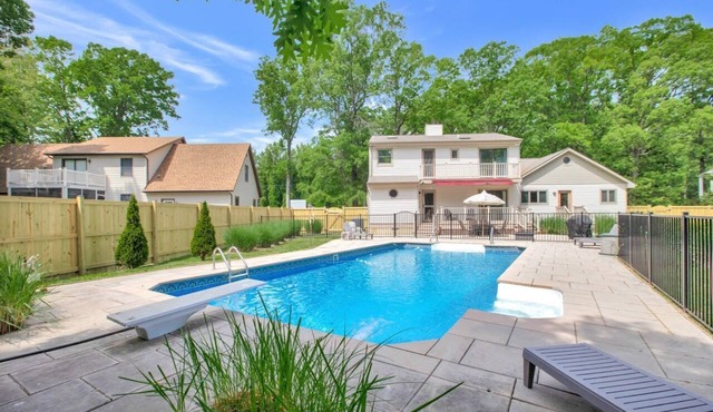 Caribbean HEATED POOL Home near Matapeake Beach!