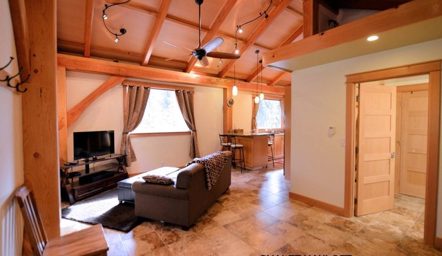 Carriage House “Hayloft” Rusticly Elegant Cottage