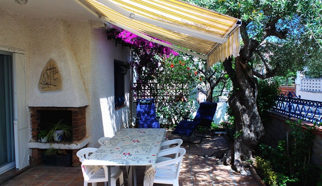 Casa Adosada con Jardin y Barbacoa a dos Pasos de la Playa