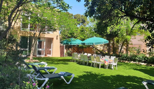Casa con jardín a 45 metros de la playa. ES.