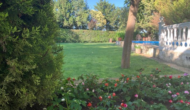 Casa con jardin