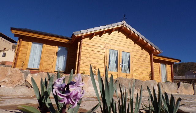 Casa de Madera con Jardín