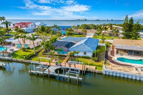 Casa De Olas - Waterfront Luxe Home - Heated Pool - Game Room - Boat Lift - Minutes to Beach