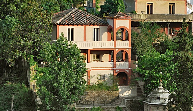 "Casabelladona: Beautiful villa surrounded by forest at the city's edge."