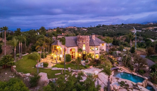 Castle on a hill, breathtaking views, surrounded with pools, trees, and lawn