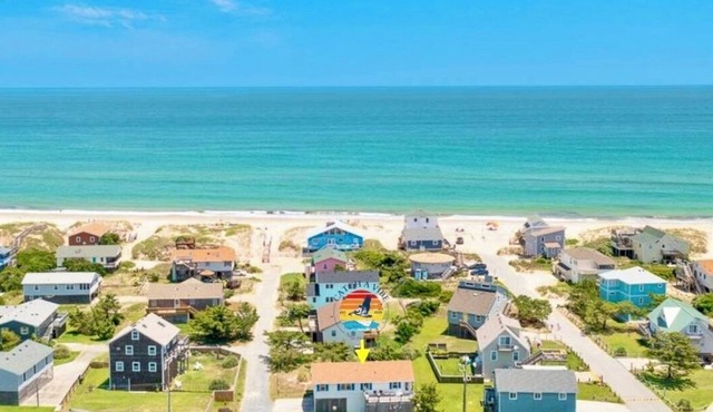 Catch a Vibe! Oceanside home 4 lots from beach. Updated with timeless OBX charm!