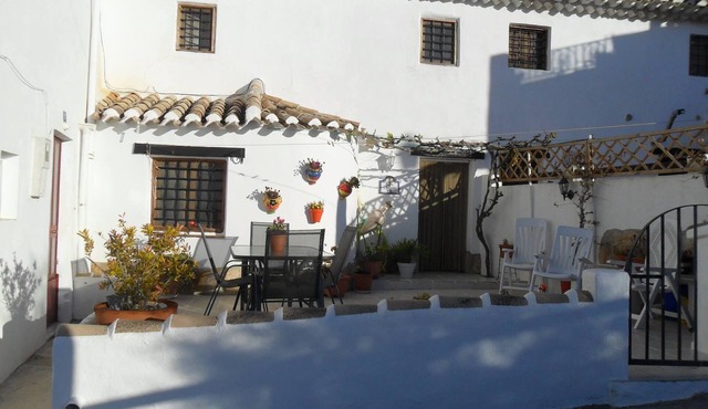 Cave House with a spectacular view of the village and across to Sagra