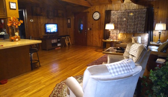 Cedar Log Cabin home on wooded bluff nestled between Springfield and Branson