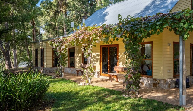 Centenary Heights - Boasting commanding views of the surrounding bushland and rolling hills of Wandiligong .