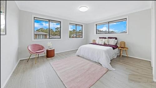 Center of Rouse Hill house with fully fenced back yard