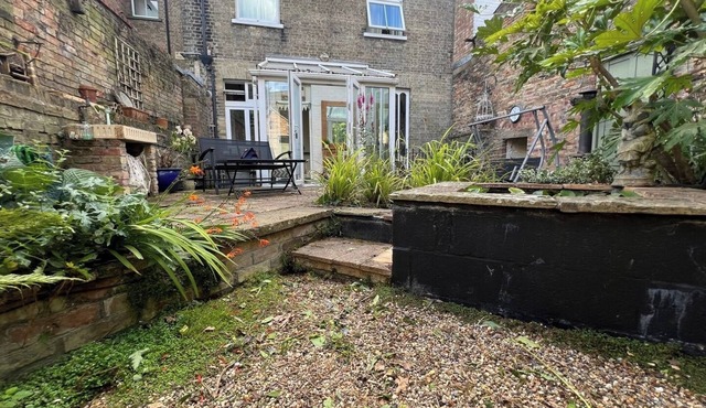 Central 3 BR Home with Private Courtyard