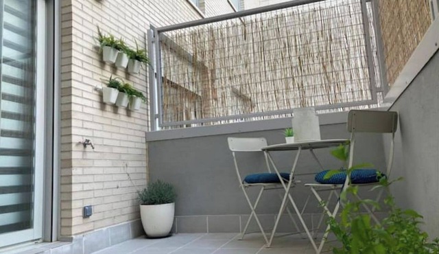 Central apartment with private parking