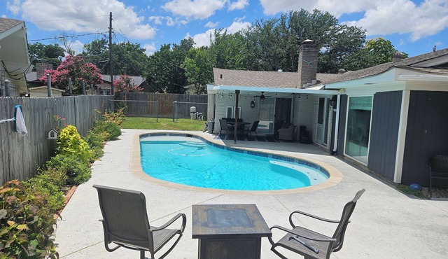 Central DFW location with cozy fireplace and pool.