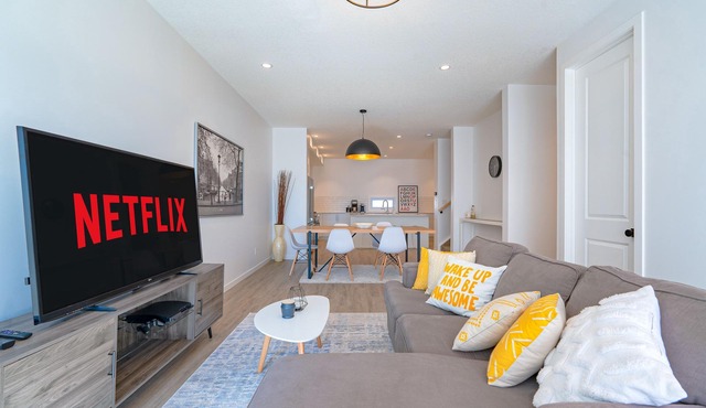 Central, Family-sized 3 BR Townhome with AC, Work Space & Private Parking