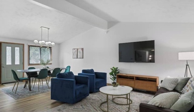 Central Location+ 2 living spaces+ covered patio!