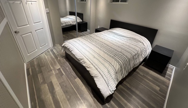 Central modern basement apartment close to lakes & skiing