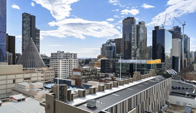 CENTRAL TO EVERYTHING 2BR APT w/CITY VIEWS + FREE WIFI + POOL + GYM