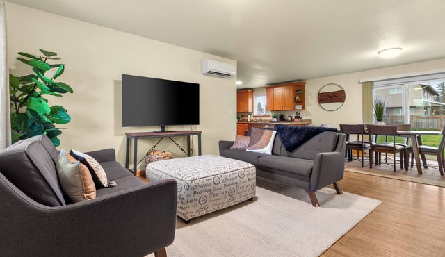 Centralia home minutes to NW Sports Hub. Modern three bedroom - primary ensuite. Two additional bedrooms with second full bathroom. Full kitchen. Fully fenced backyard with covered patio. In home laundry - full size washer/dryer. Parking - 4 cars