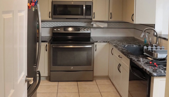 Centrally located comfortable North Valley home, an art filled oasis in the city
