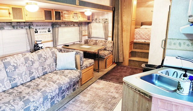 Centrally located Cozy RV with all the essentials in spacious secure gated area!
