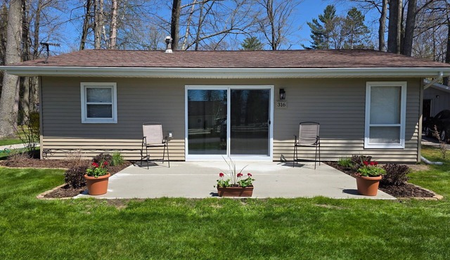 Centrally located, four season retreat w/firepit and lakeview.