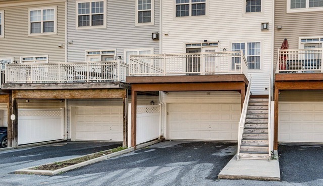 Centrally located Spacious 4-bedroom townhome in tranquil Laurel with AC.