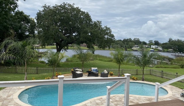 Centrally located, waterfront, Heated pool home.