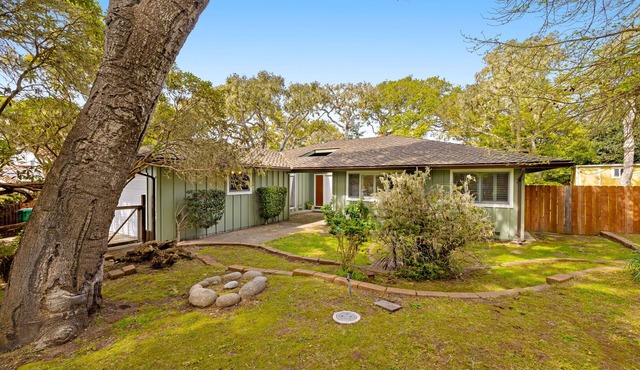 Centrally located home with a large yard, board games, & W/D