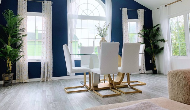 Centric & spacious home with ample parking and king beds in all rooms.