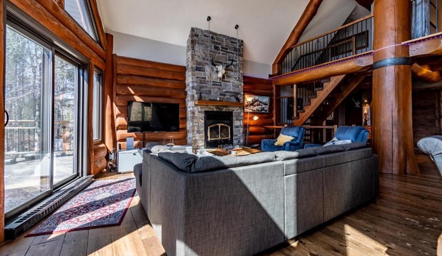 Chalet bois rond avec spa, foyer et nature privée